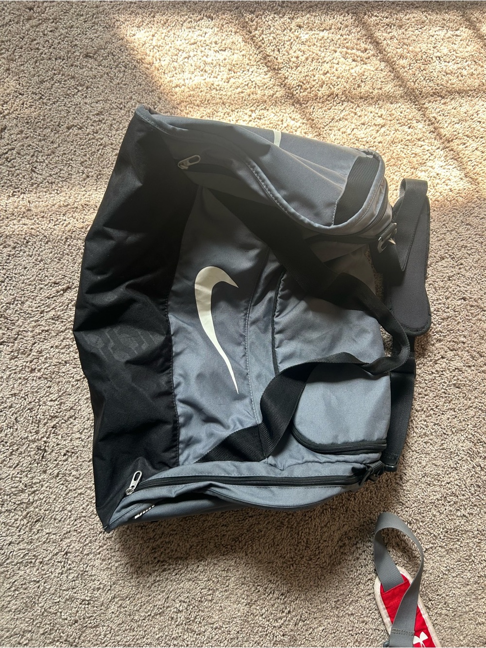 Nike Gray and Black Duffel Bag with White Swoosh